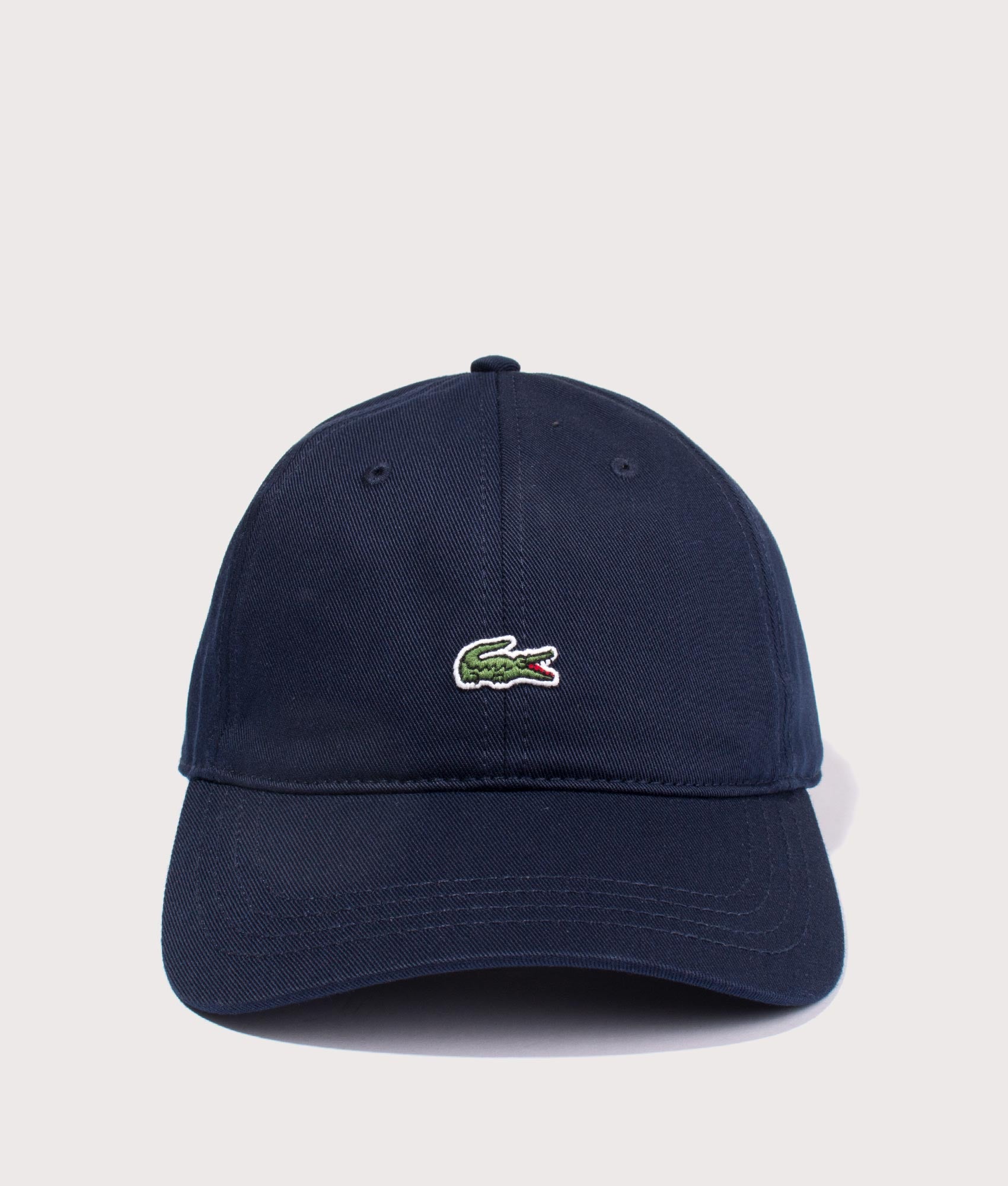Lacoste Crocodile Cap in Navy Blue at EQVVS Menswear. Front shot.