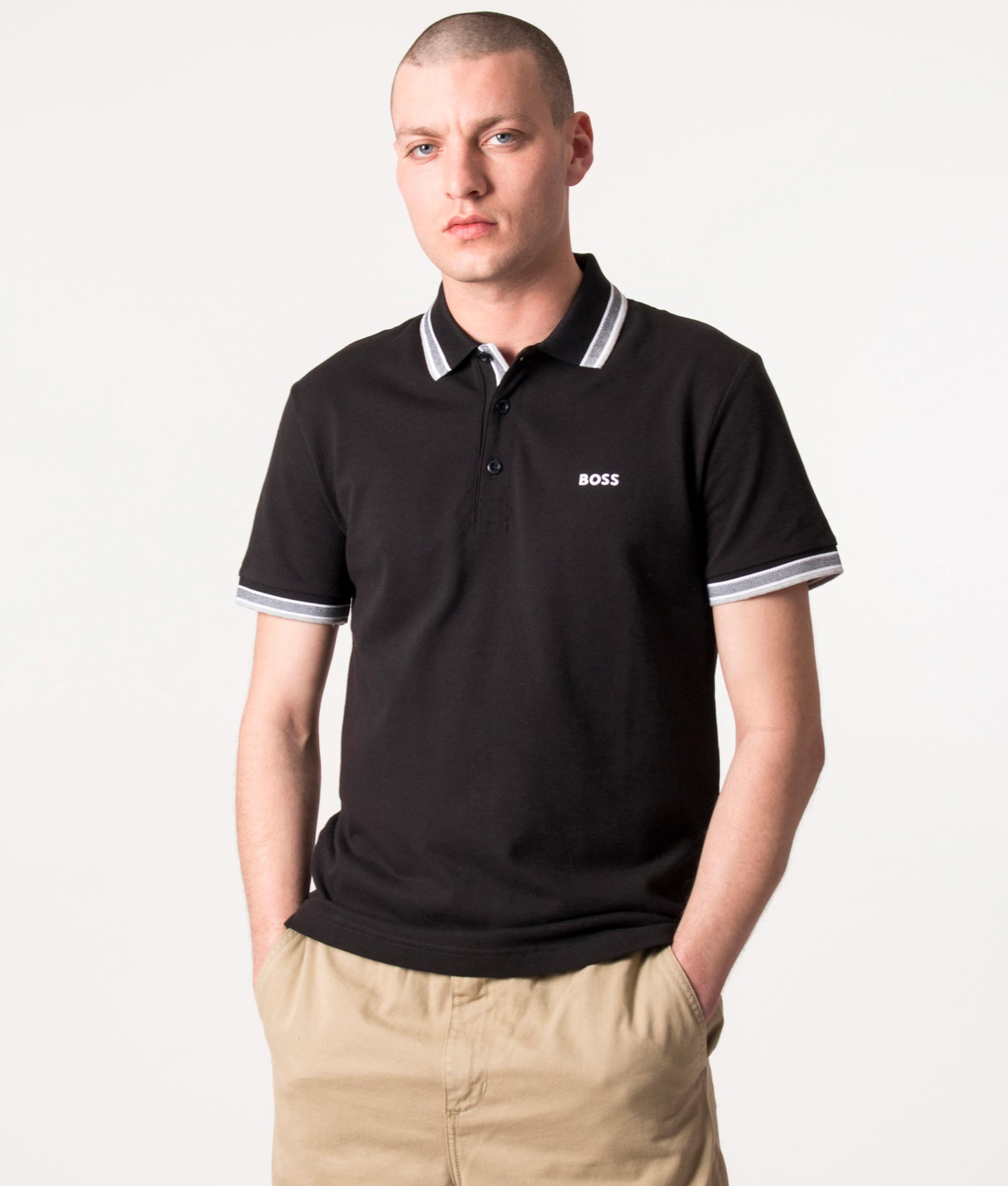 BOSS Paddy Polo Shirt in Black at EQVVS Menswear. Model front shot.