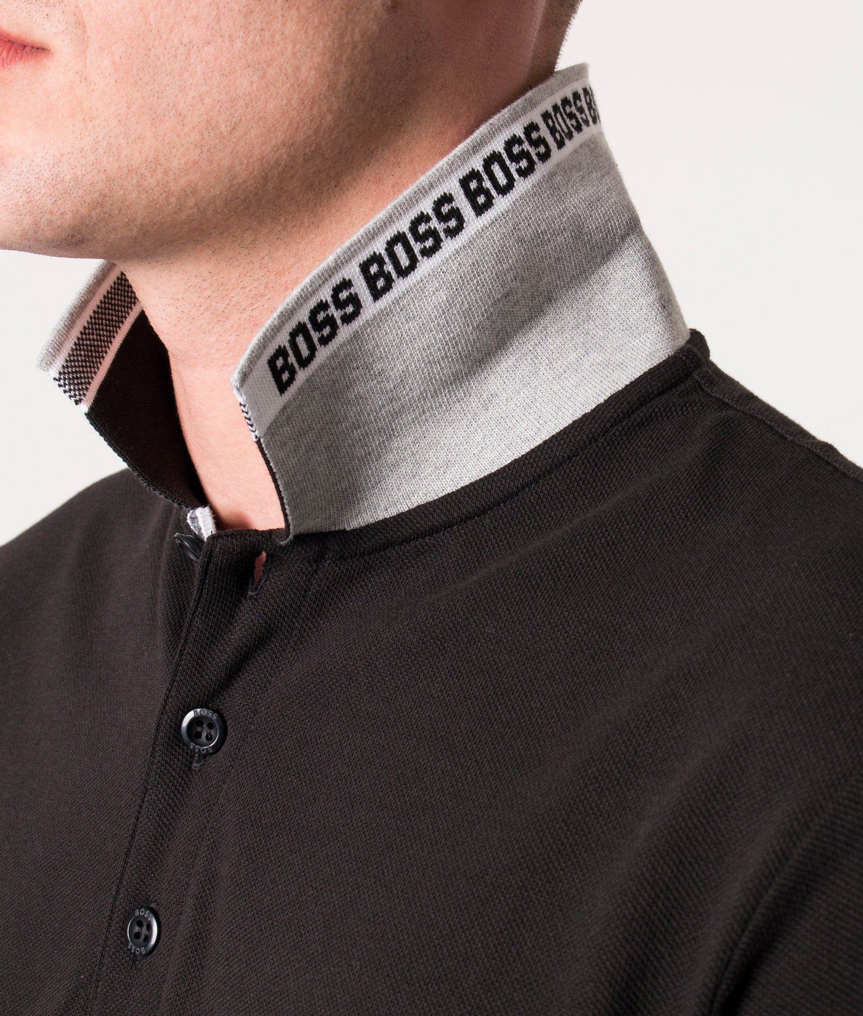 BOSS Paddy Polo Shirt in Black at EQVVS Menswear. Second detail shot.