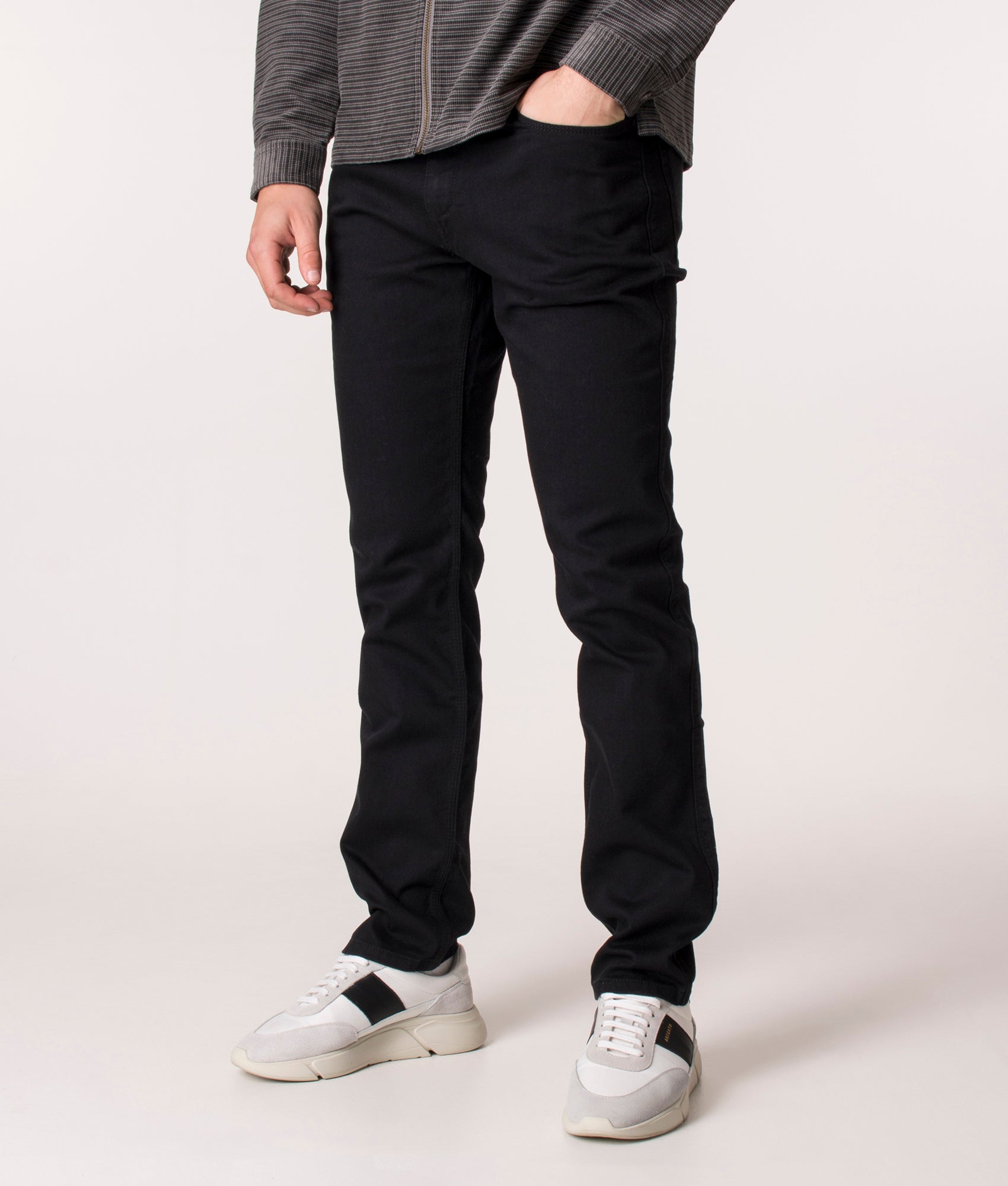 HUGO Slim Fit 708 Jeans, Black. EQVVS. Model, angle. 