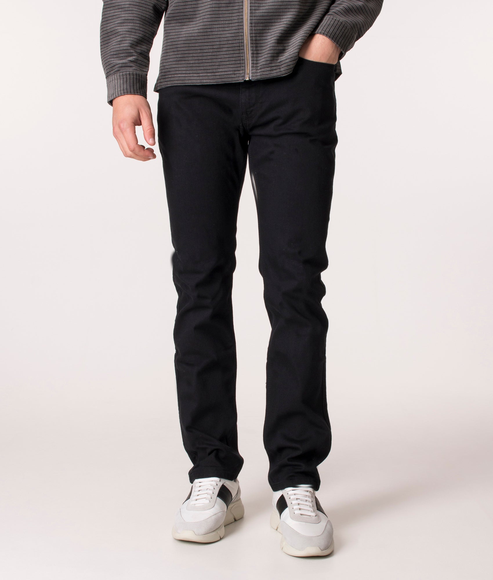 HUGO Slim Fit 708 Jeans, Black. EQVVS. Model, front. 