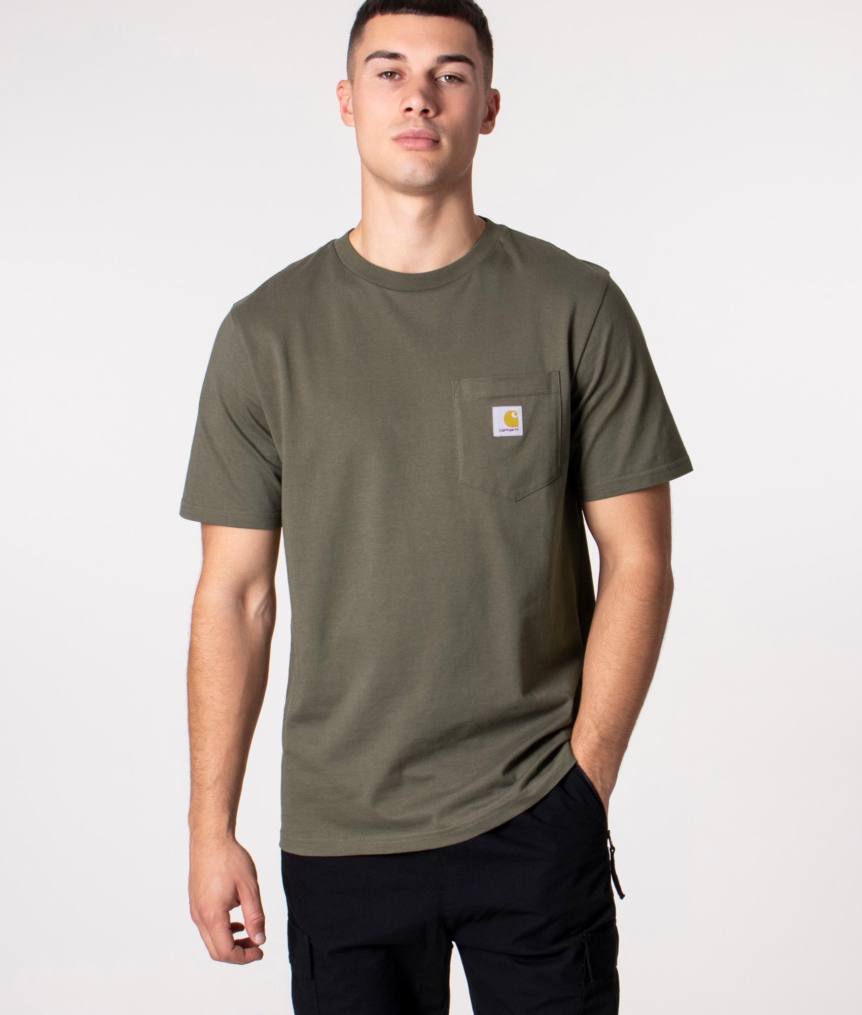 Pocket T-Shirt in Khaki Green by Carhartt WIP at EQVVS. Front Shot. 