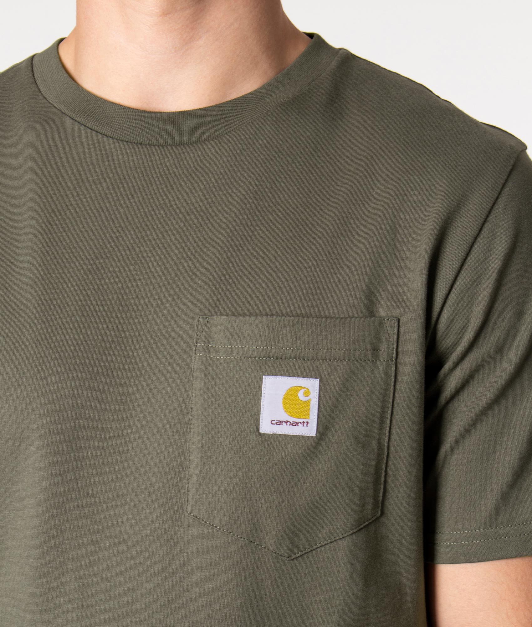 Pocket T-Shirt in Khaki Green by Carhartt WIP at EQVVS. Detail Shot. 