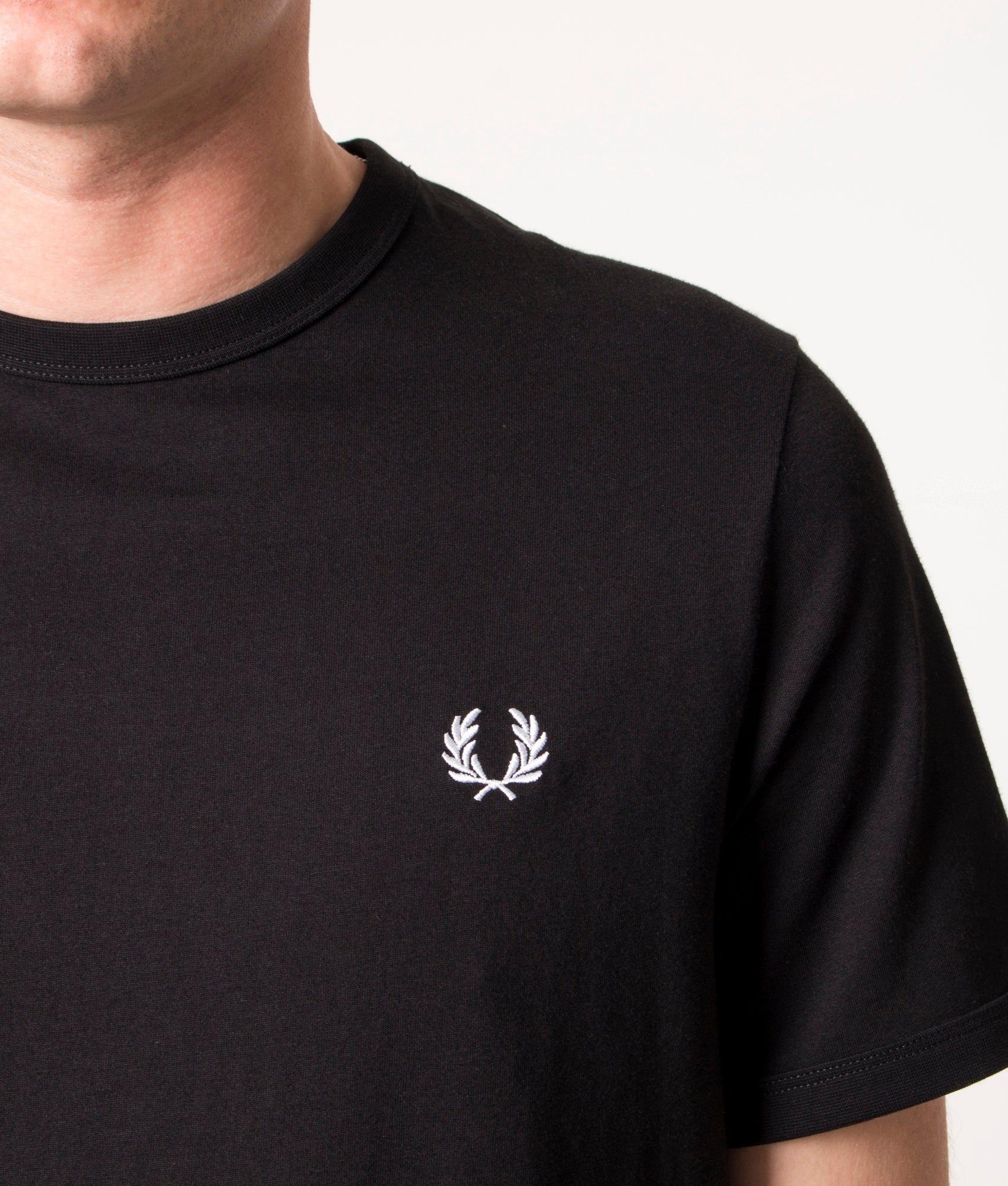 Fred Perry Ringer T-Shirt in Core Black at EQVVS Menswear. Detail shot.