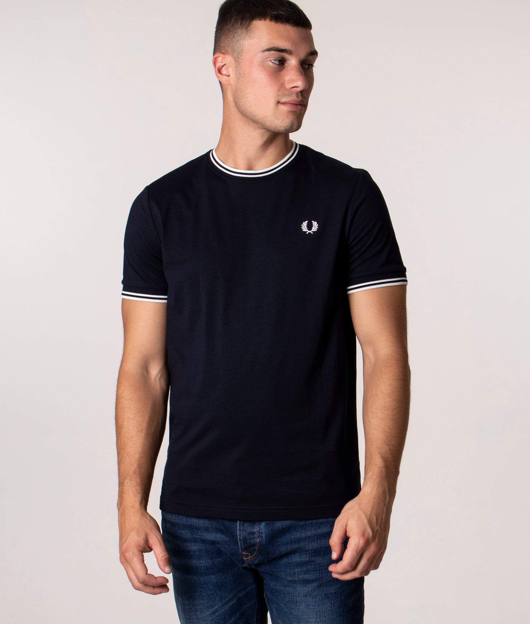 Fred Perry Twin Tipped T-Shirt in Core Navy at EQVVS Menswear. Model front shot. 