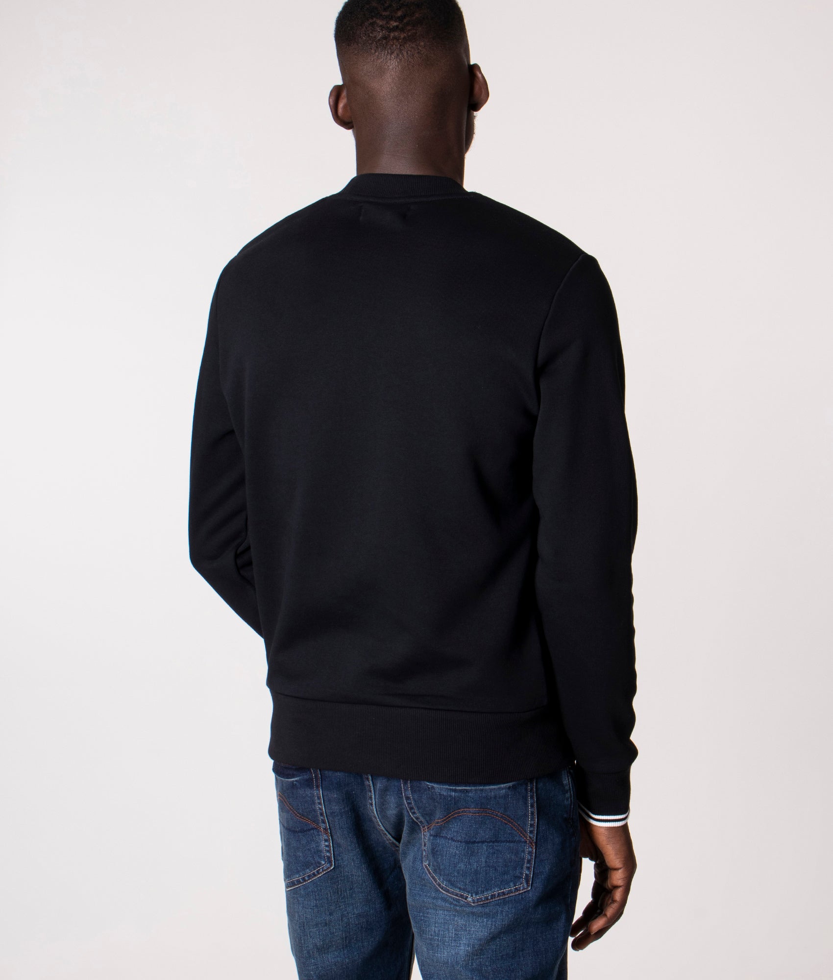 Fred Perry Crew Neck Sweatshirt in Core Black at EQVVS Menswear. Model back shot.