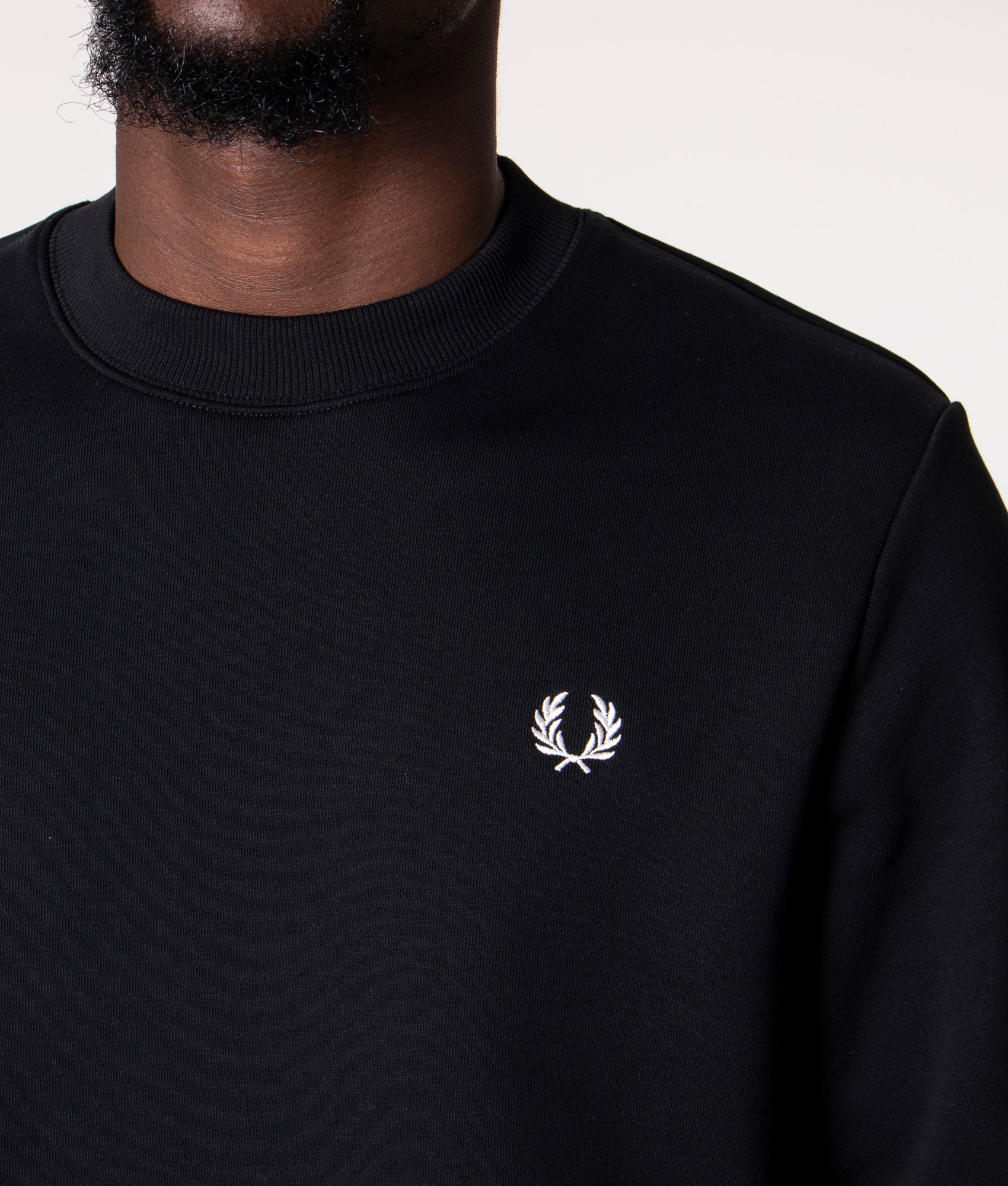 Fred Perry Crew Neck Sweatshirt in Core Black at EQVVS Menswear. Detail shot.