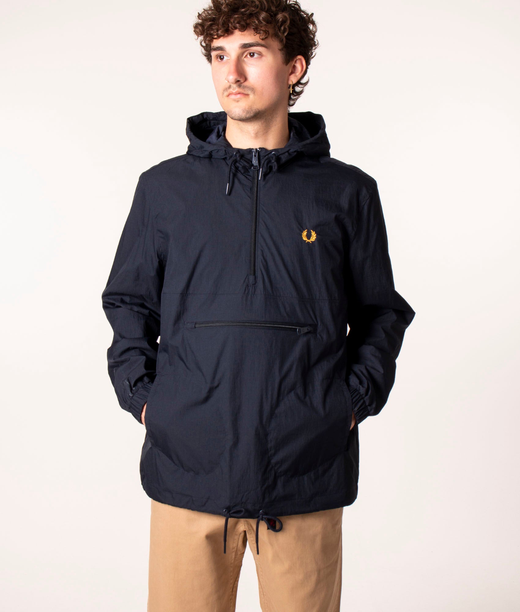 Fred Perry Half Zip Hooded Cagoule in Navy at EQVVS. Model, Front.