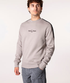 Fred Perry Tape Sleeve Sweatshirt in Concrete at EQVVS, Model, front angle