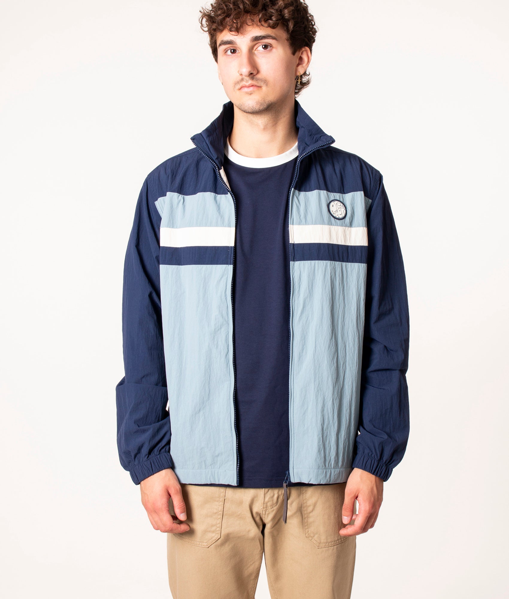 Pretty Green Tilby Track Jacket in Navy at EQVVS, Model front
