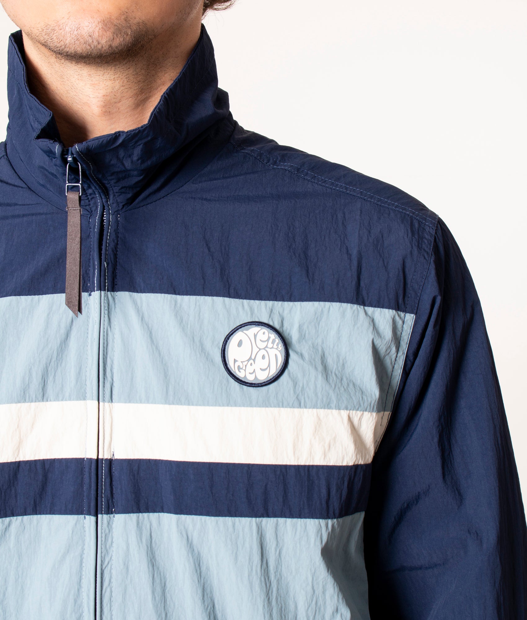 Pretty Green Tilby Track Jacket in Navy at EQVVS, Model front detail