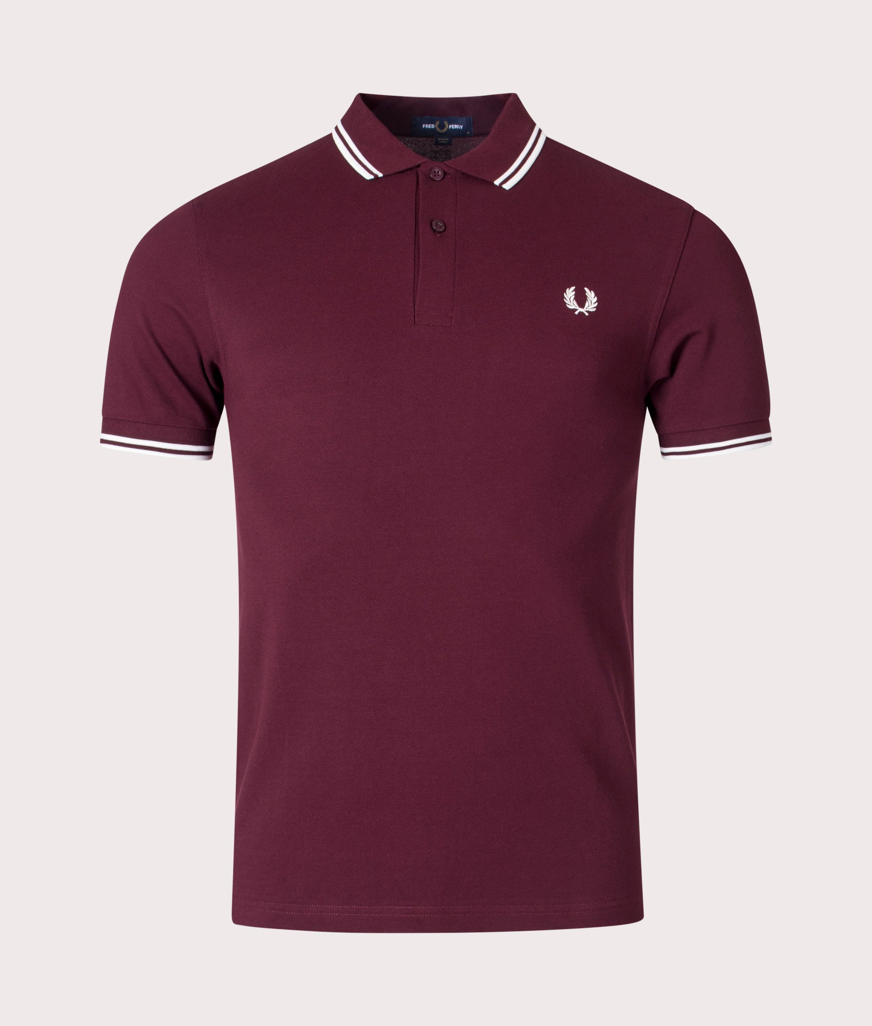 Fred Perry Twin Tipped Polo Shirt in Oxblood at EQVVS Menswear. Front shot.