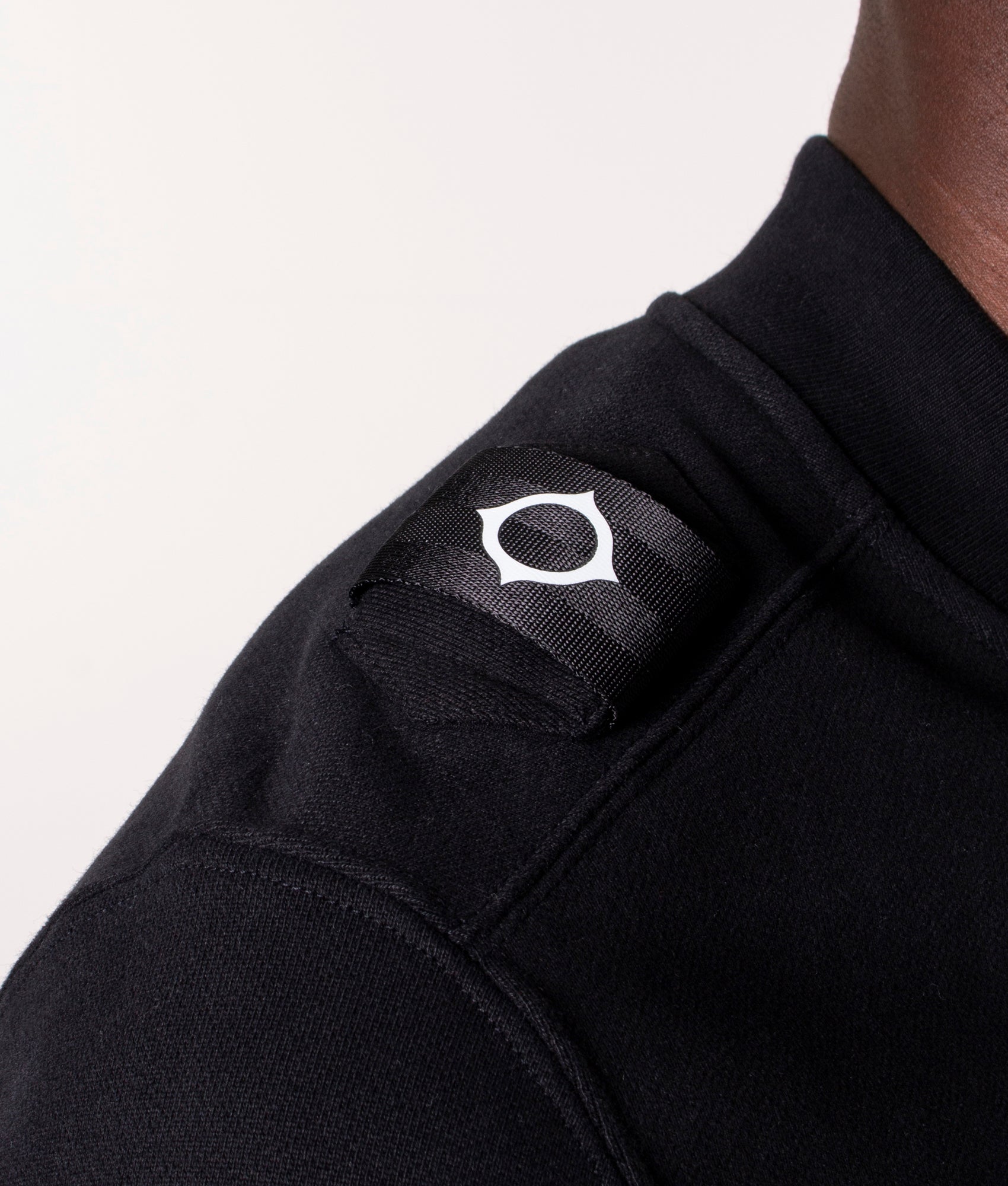 Core Bomber Sweatshirt M000 Jet Black, Ma.Strum, EQVVS, Model shoulder detail