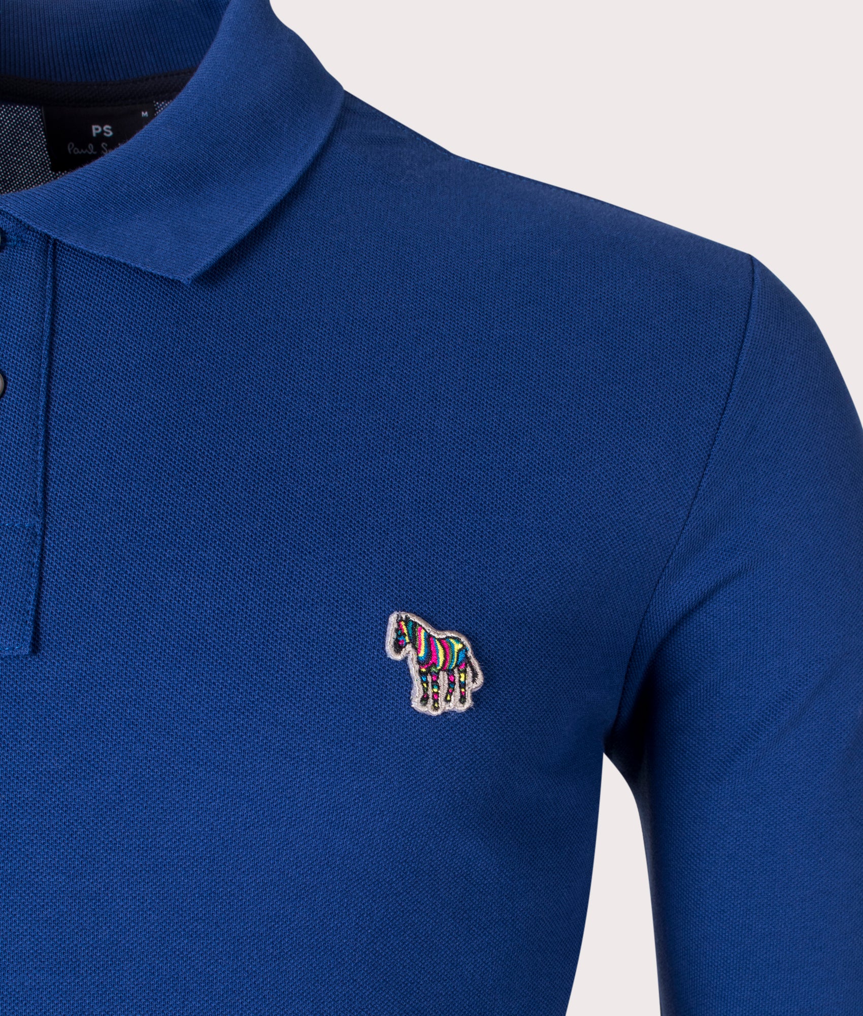 Long Sleeve Zebra Badge Polo Shirt in Cobalt Blue by PS Paul Smith at EQVVS detail image