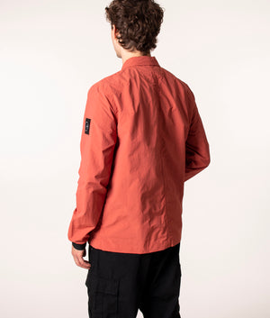 Marshall Artist Cotton Polyamide Overshirt in Rust at EQVVS. Model, back.