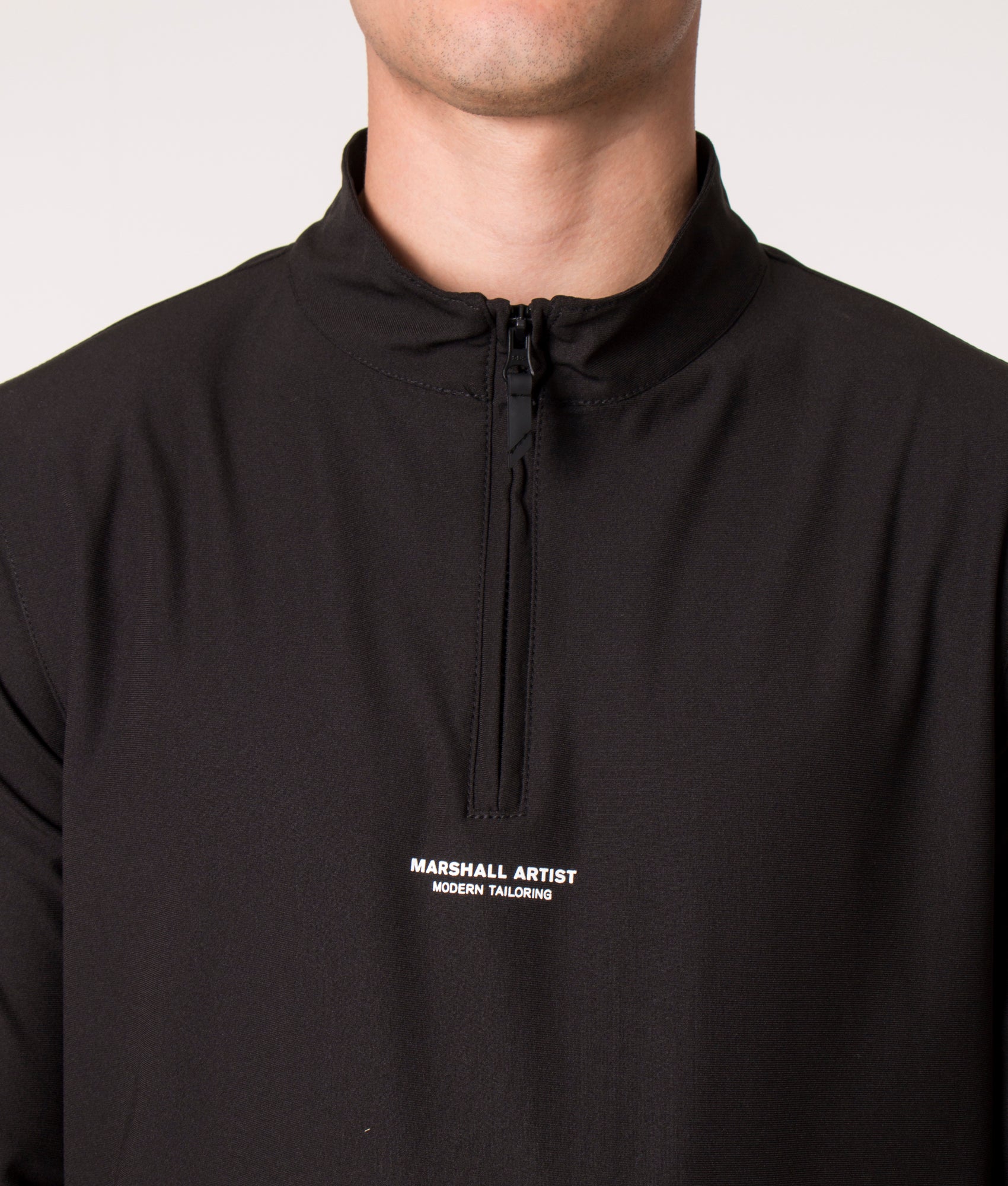Softshell Training Long Sleeve T-Shirt in Black by Marshall Artist at EQVVS Model Front Detail