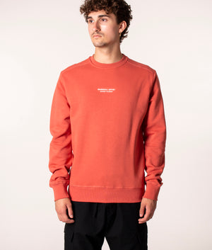 Marshall Artist Siren Crew Sweatshirt in Rust at EQVVS. Model, front. 
