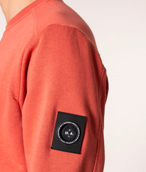 Marshall Artist Siren Crew Sweatshirt in Rust at EQVVS. Model, detail 2. 
