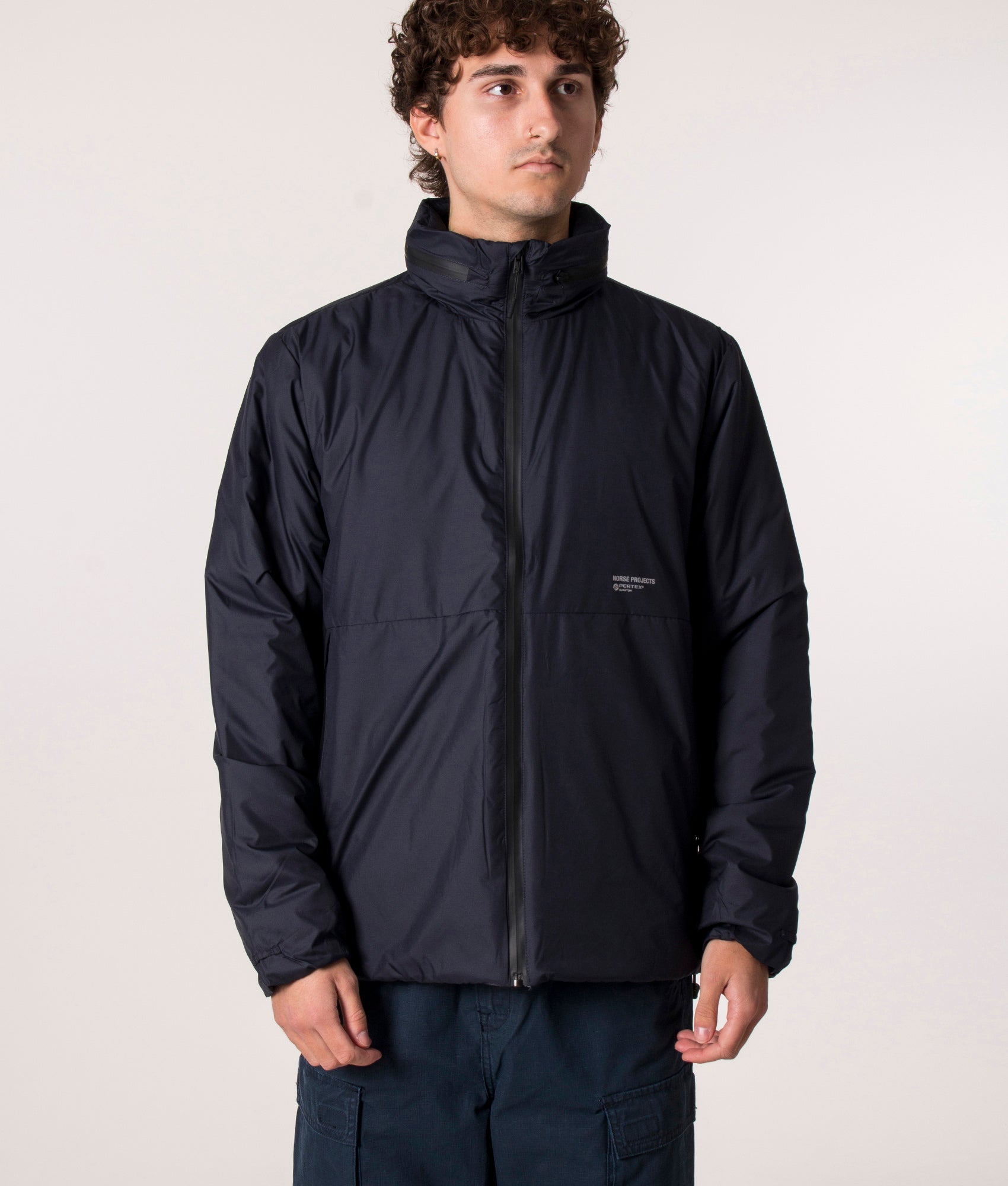 Norse Projects Alta Light Pertex Jacket in Navy Blue, EQVVS. Model, front.