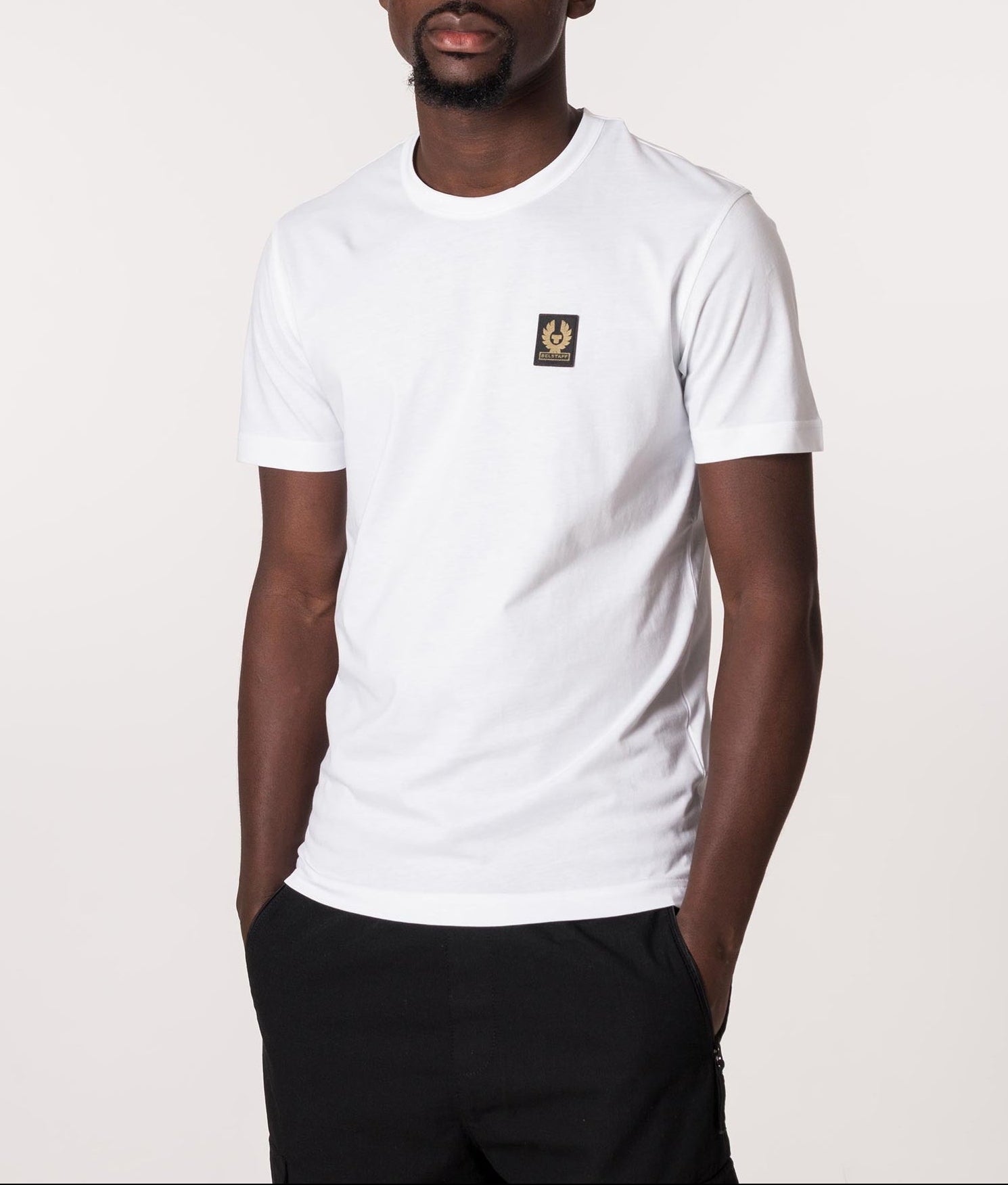 Belstaff T-Shirt in White at EQVVS Menswear. Model front shot. 