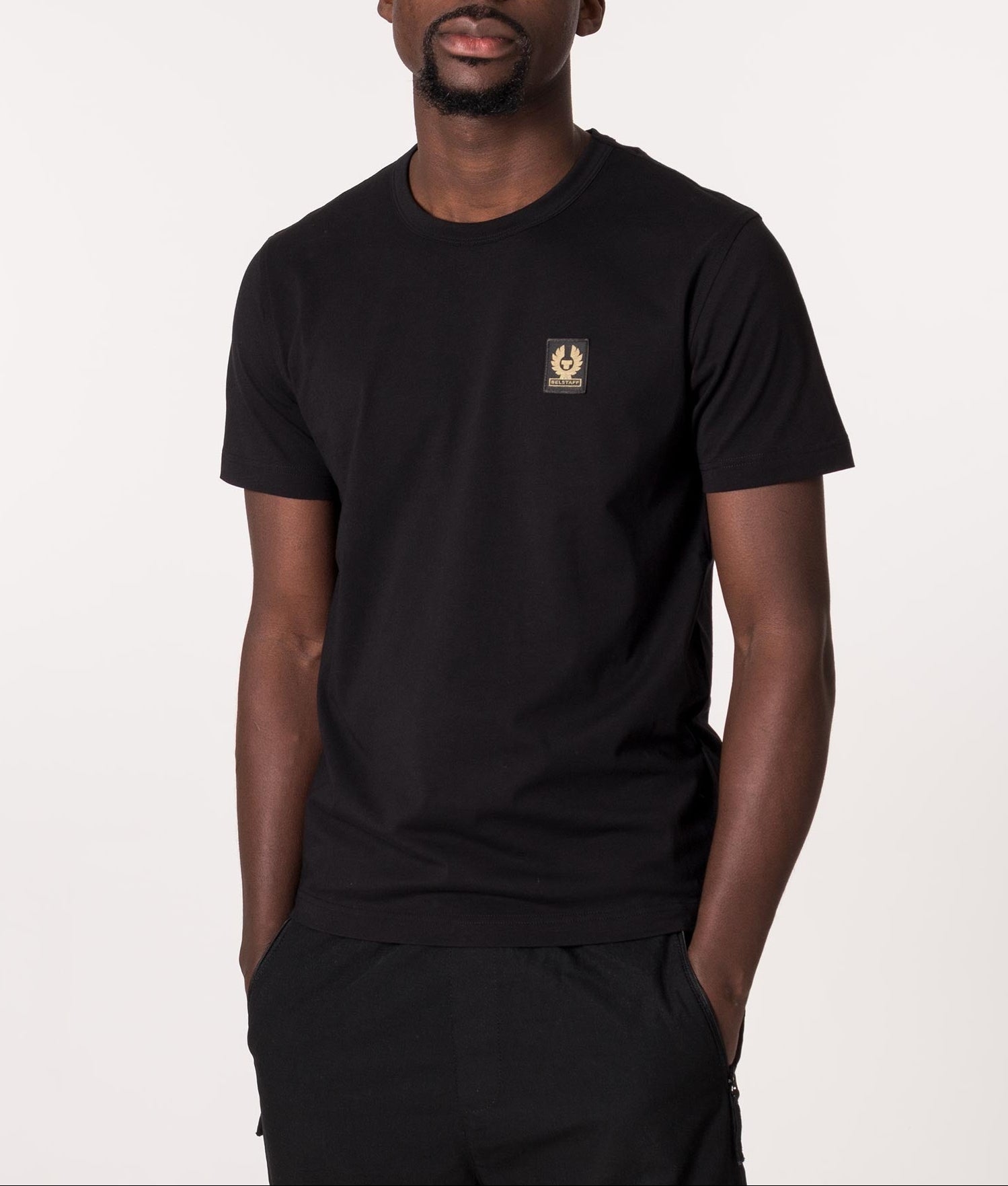 Belstaff T-Shirt in Black at EQVVS Menswear. Model front shot.