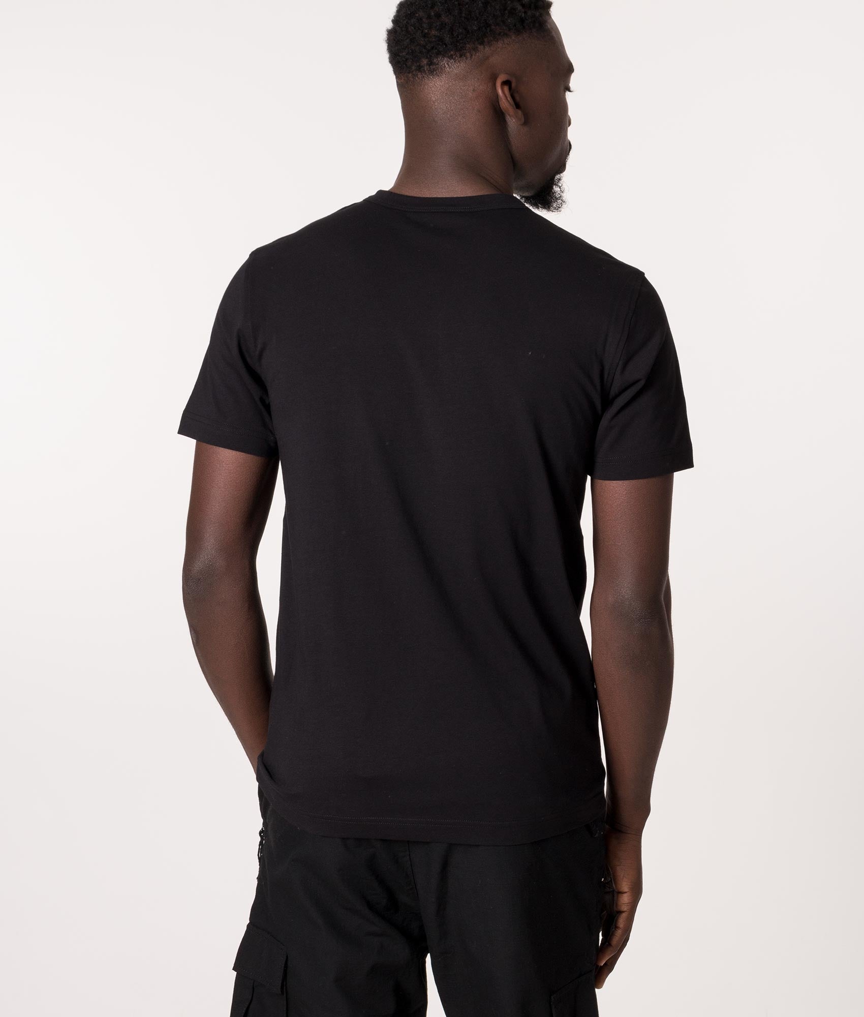 Belstaff T-Shirt in Black at EQVVS Menswear. Model back shot.