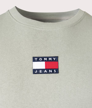Tommy Badge T-Shirt in Faded Willow by Tommy Jeans at EQVVS detail image